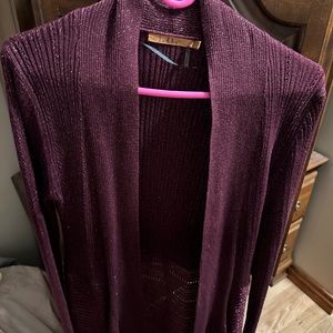 Purple cover sweater.
